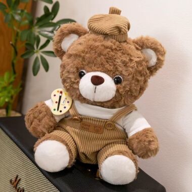 Artist teddy bear plush wearing a painter’s outfit and hat
