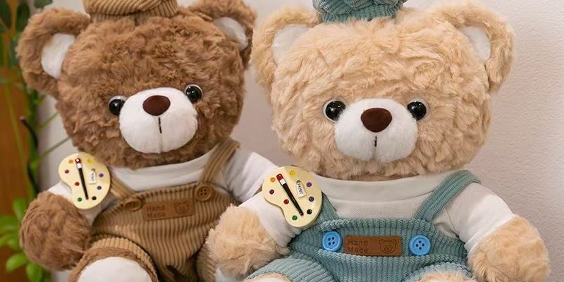 Artist teddy bear plush wearing a painter’s outfit and hat