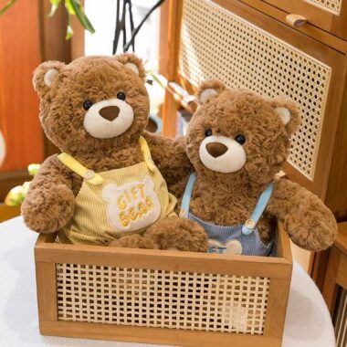 Cute teddy bear in strap overalls for birthday gifting