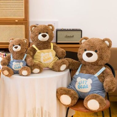 Cute teddy bear in strap overalls for birthday gifting