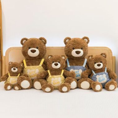 Cute teddy bear in strap overalls for birthday gifting