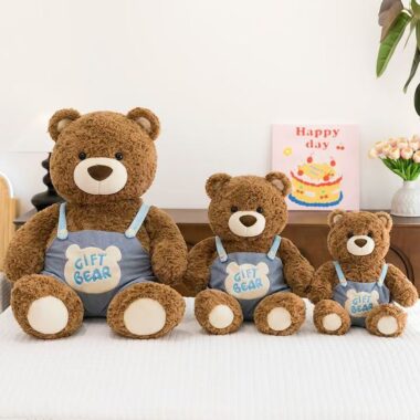 Cute teddy bear in strap overalls for birthday gifting