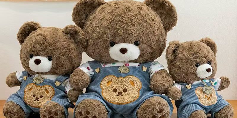 Cute teddy bear plush wearing soft overalls outfit design
