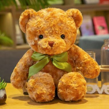 Soft hugging teddy bear plush designed for birthday gifting