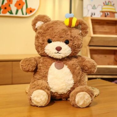 Cute kids birthday teddy bear plush toy in soft colors