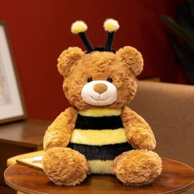 Cute kids birthday teddy bear plush toy in soft colors