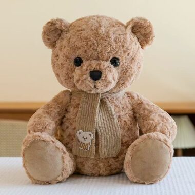 Soft hugging teddy bear plush with cute gentle expression