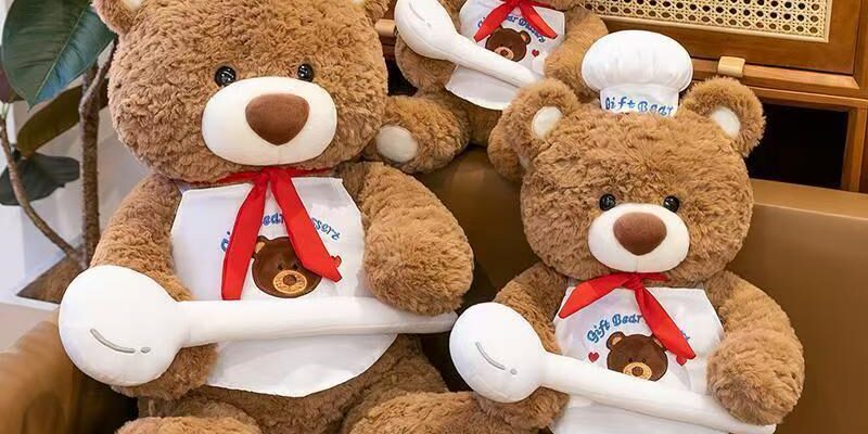 Cute teddy bear plush toy hugging a spoon for gifting