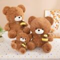 Soft cute teddy bear plush holding a honey pot for gifting