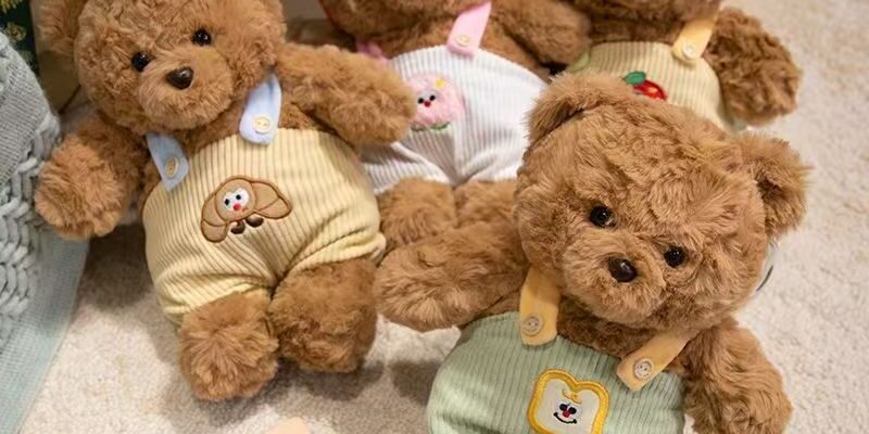 Cute teddy bear plush wearing strap overalls for gifting