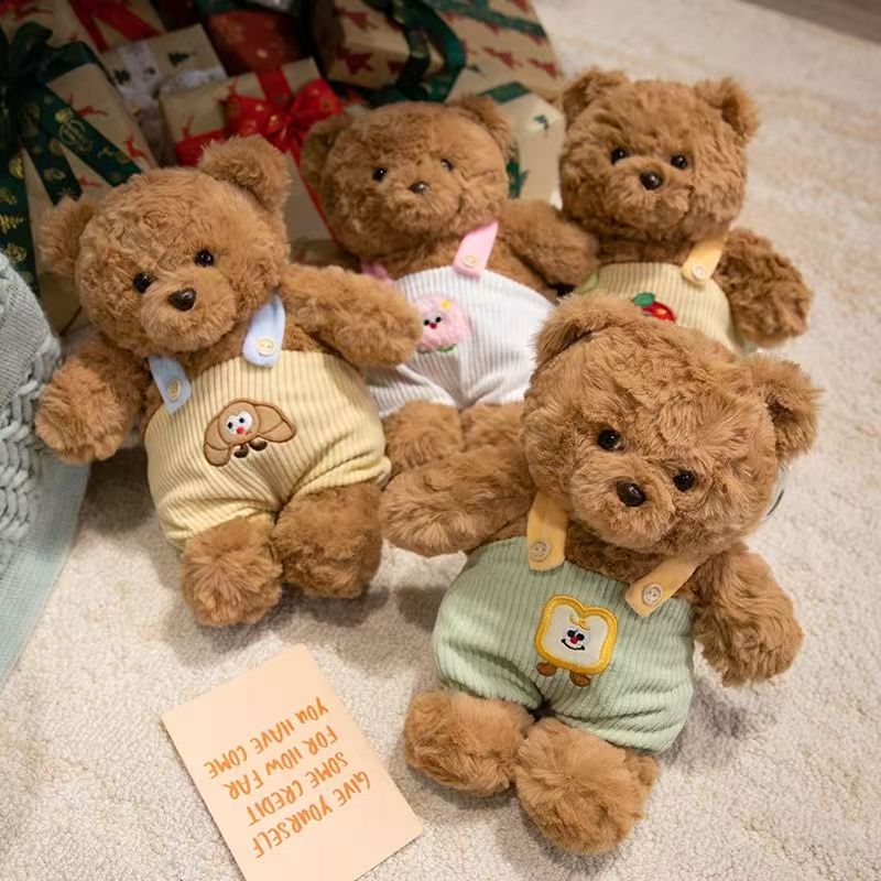 Cute teddy bear plush wearing strap overalls for gifting