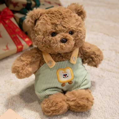 Cute teddy bear plush wearing strap overalls for gifting