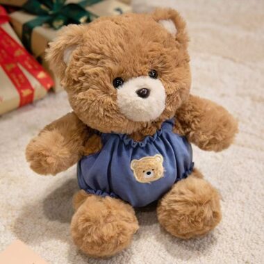Cute teddy bear plush wearing strap overalls for gifting