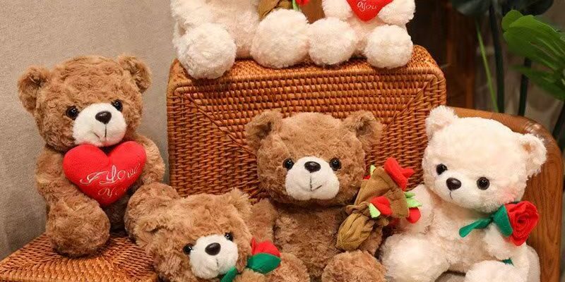 Cute teddy bear holding flowers for romantic gifting