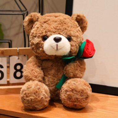 Cute teddy bear holding flowers for romantic gifting